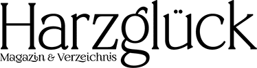 Schwarzer Schriftzug "Harzglück Magazin & Verzeichnis" auf weißem Hintergrund.